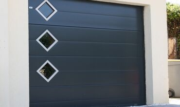 Portes de garage &agrave;&nbsp;LANEUVILLE AU RUPT